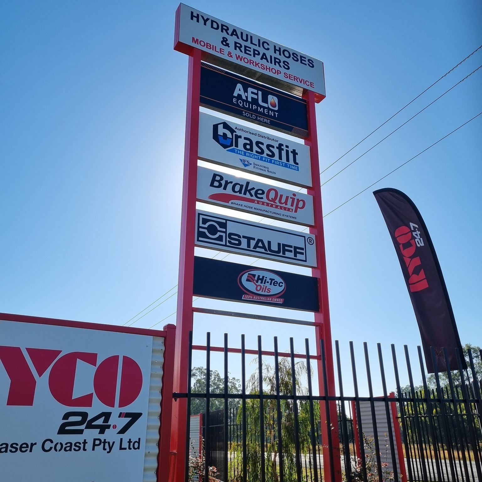 Clear And Durable Building Signage Side View Photo — Zip Print Australia in Maryborough, QLD